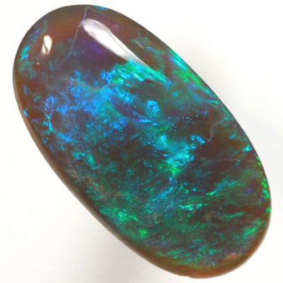 SOLID BLACK CRYSTAL OPAL Rolling flashes of green and turquoise purple fire